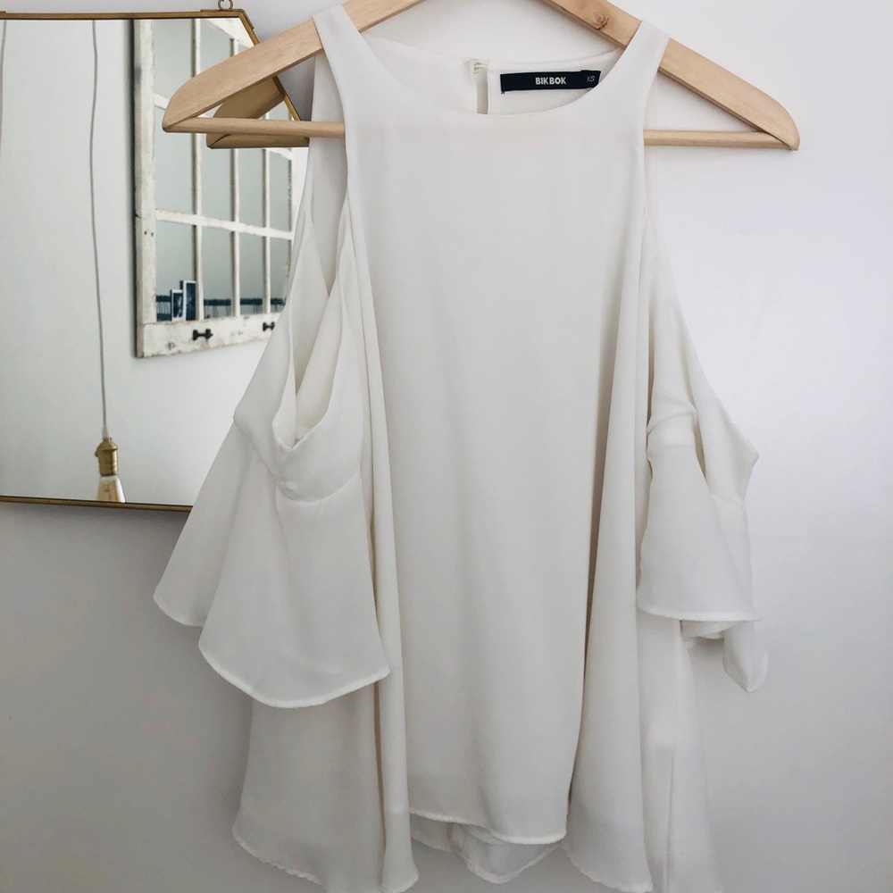 Peep shoulder white blouse